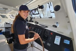 Majestic 530 girl at helm